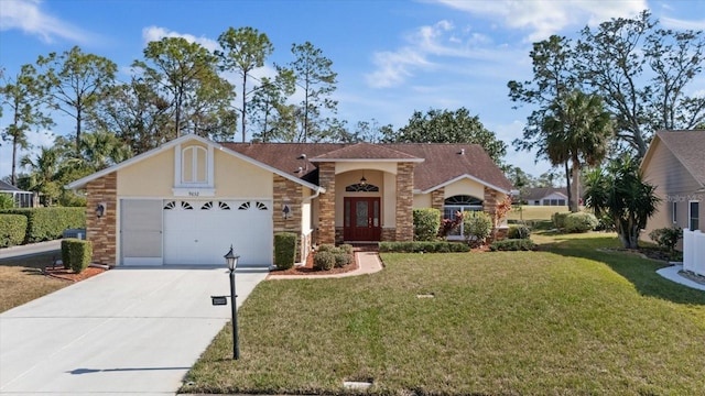 ranch-style home with a garage and a front yard