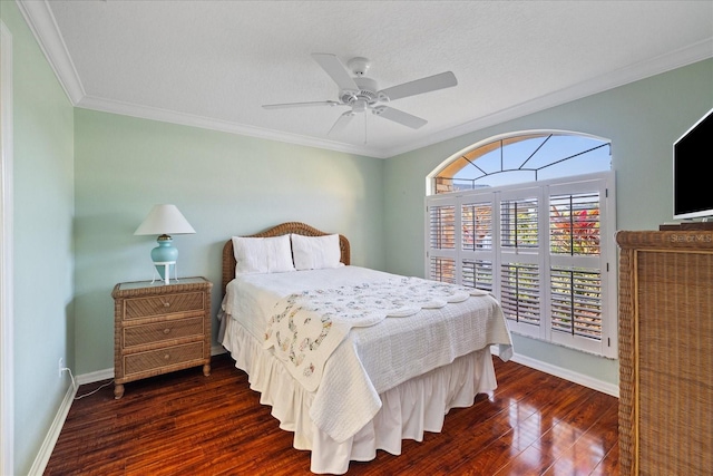 bedroom featuring dark hardwood / wood-style flooring, crown molding, access to outside, and ceiling fan