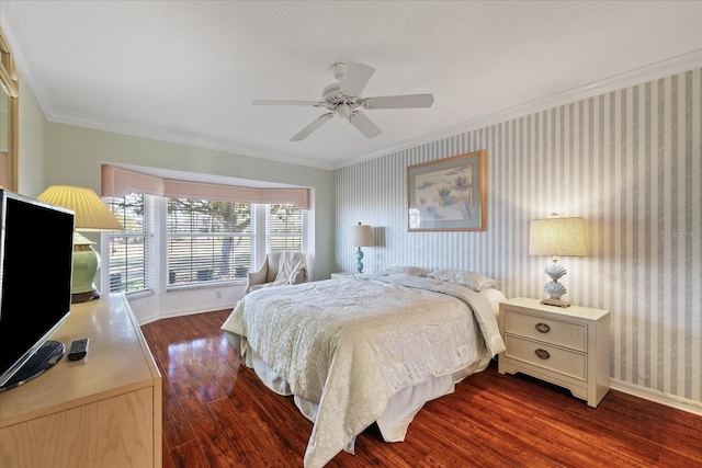 bedroom featuring ornamental molding, ceiling fan, and dark hardwood / wood-style flooring