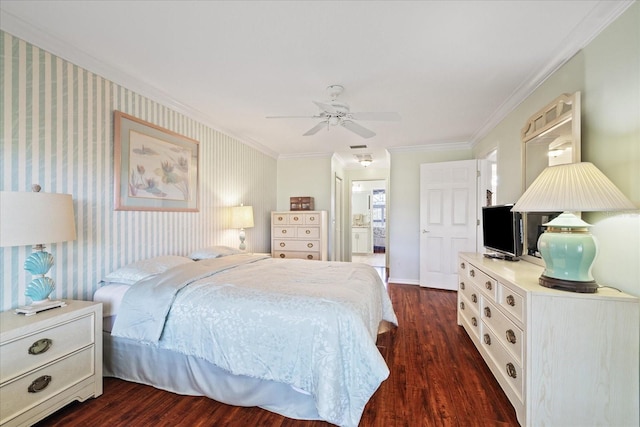 bedroom featuring crown molding, ceiling fan, ensuite bathroom, and dark hardwood / wood-style floors