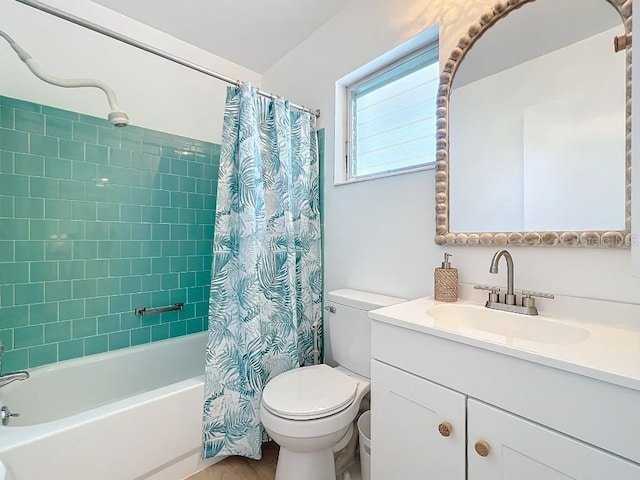 full bathroom with vanity, toilet, and shower / tub combo