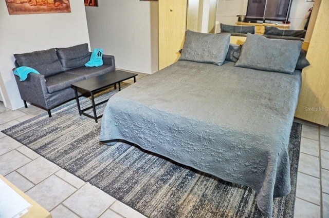 bedroom featuring tile patterned floors