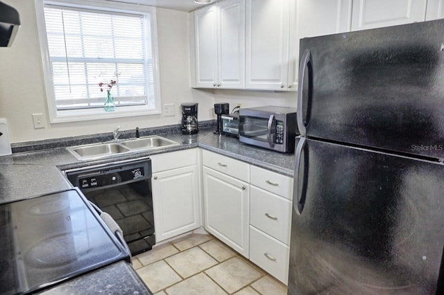 kitchen with white cabinetry, sink, light tile patterned floors, and black appliances