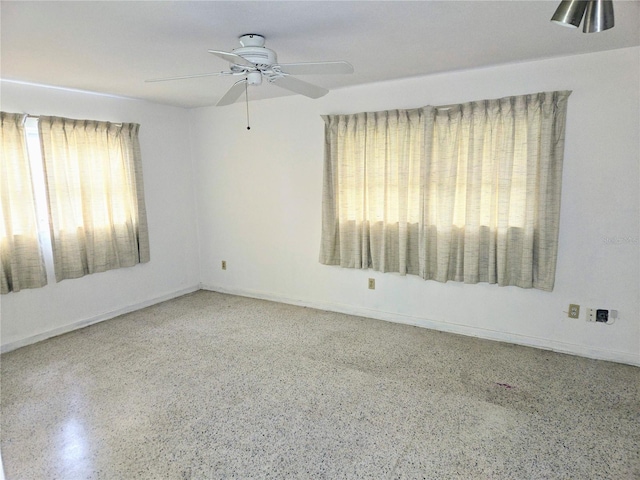 empty room featuring ceiling fan