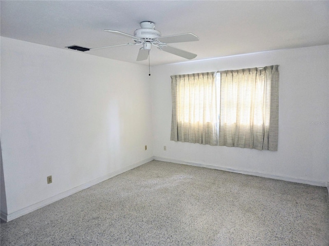 empty room featuring ceiling fan