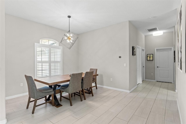 dining room with an inviting chandelier