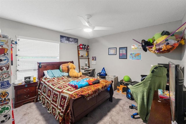 carpeted bedroom with ceiling fan