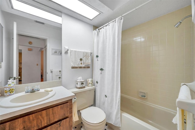 full bathroom featuring vanity, toilet, and shower / tub combo