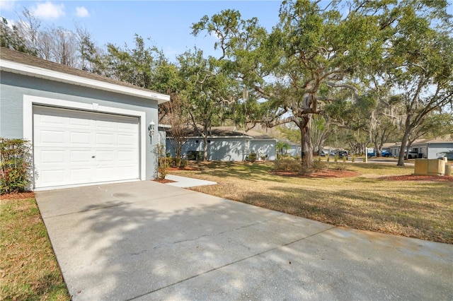 garage with a lawn