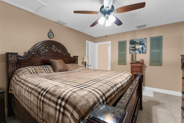 bedroom featuring light tile patterned flooring and ceiling fan