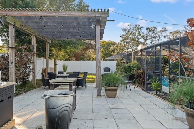 view of patio with a lanai and a pergola