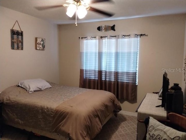 bedroom featuring ceiling fan