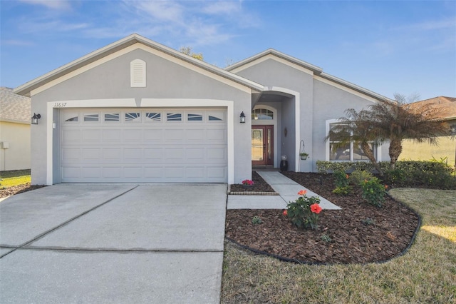 single story home featuring a garage