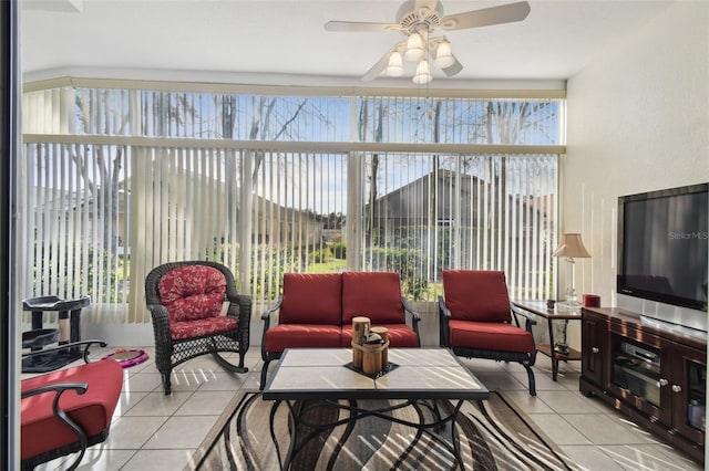 sunroom / solarium with plenty of natural light and ceiling fan