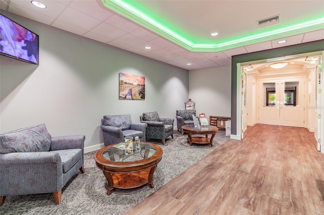 sitting room featuring hardwood / wood-style flooring