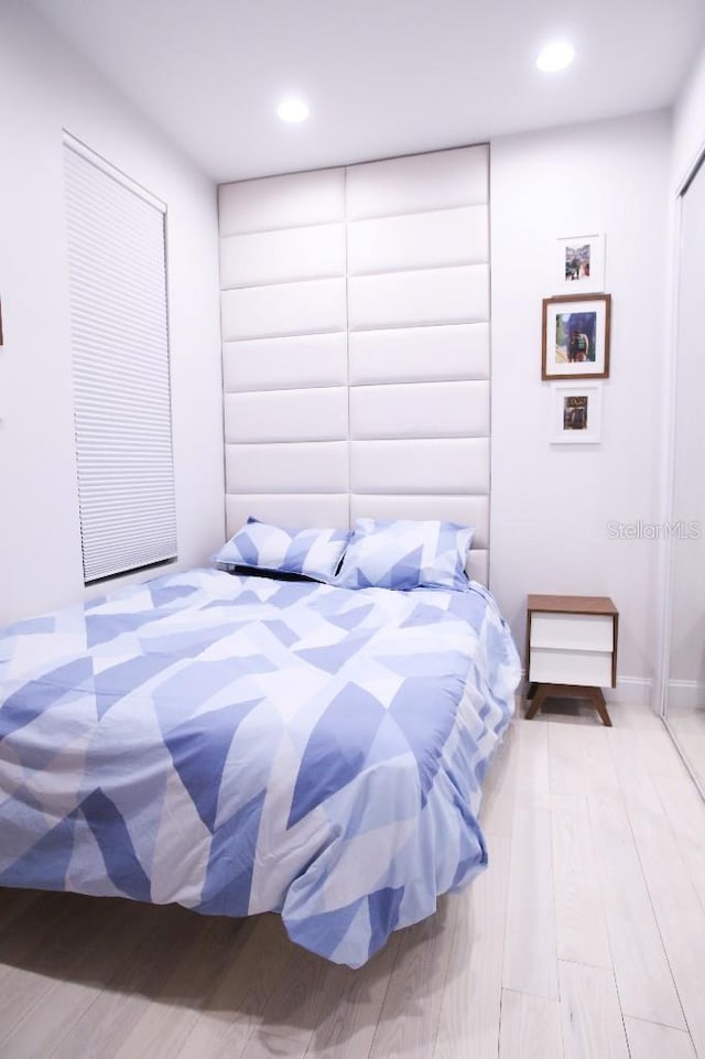 bedroom featuring light hardwood / wood-style flooring