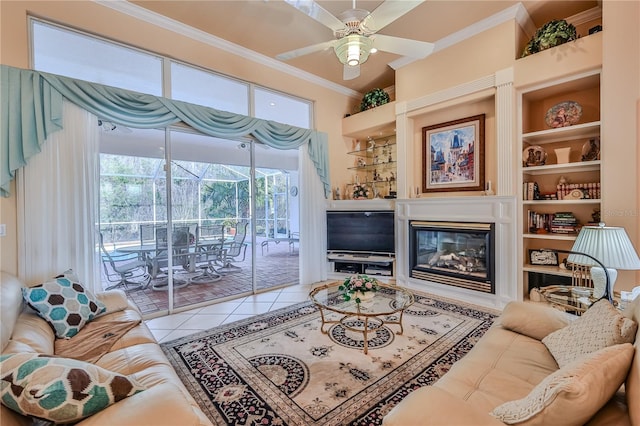 tiled living room featuring crown molding, built in features, and ceiling fan