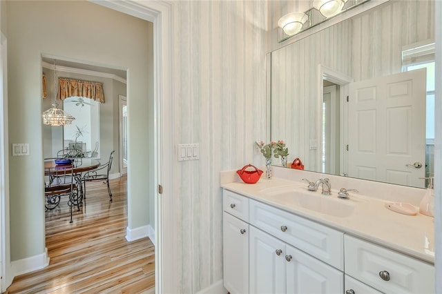 bathroom with vanity and hardwood / wood-style floors