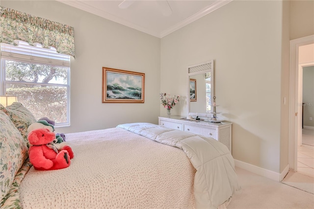 bedroom with crown molding, ceiling fan, and light carpet