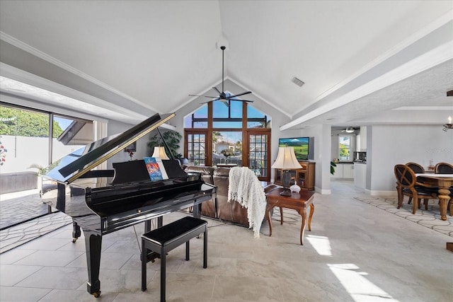 misc room featuring a wealth of natural light, ornamental molding, ceiling fan, and vaulted ceiling