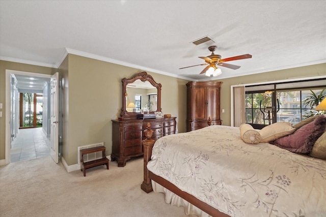 carpeted bedroom with ceiling fan, ornamental molding, and multiple windows