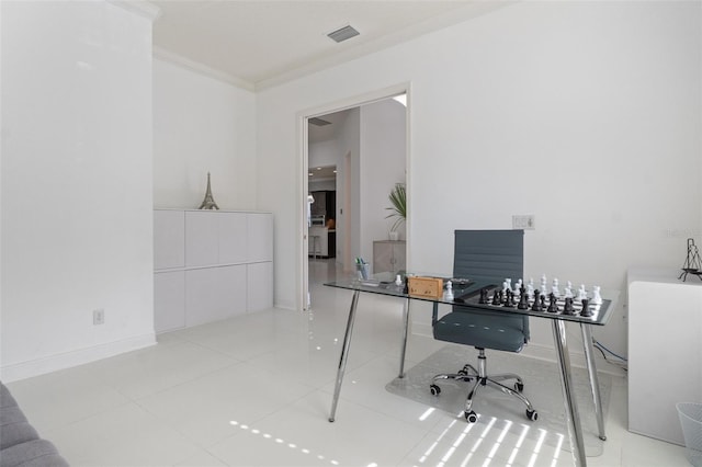 office space featuring ornamental molding and light tile patterned floors