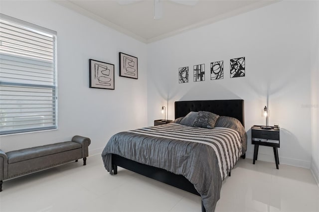 bedroom featuring ornamental molding and ceiling fan