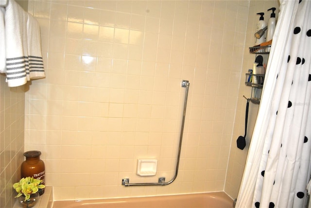 bathroom featuring shower / bath combination with curtain