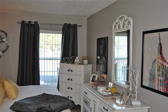 bedroom with a textured ceiling