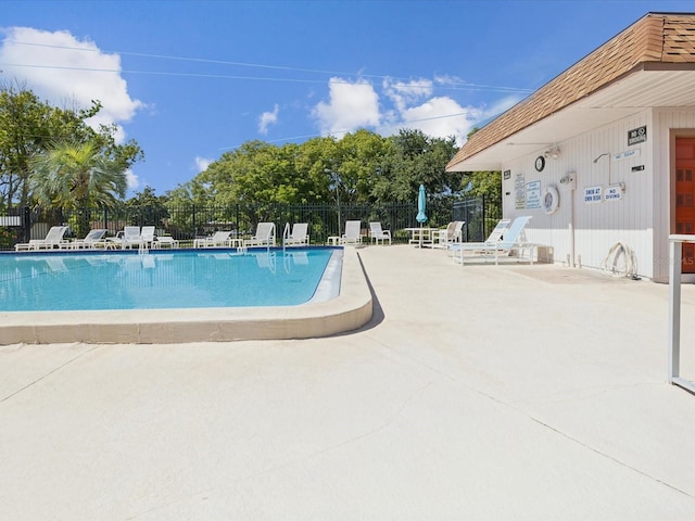 view of pool featuring a patio