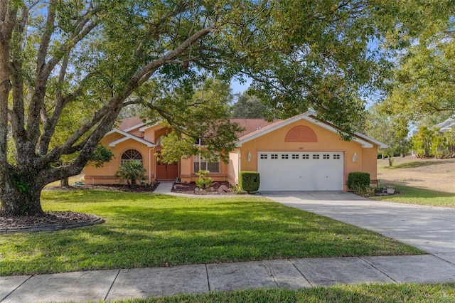 view of front facade featuring a garage and a front yard