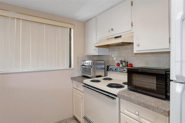 kitchen featuring backsplash, white appliances, and white cabinets