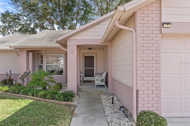 entrance to property featuring a garage