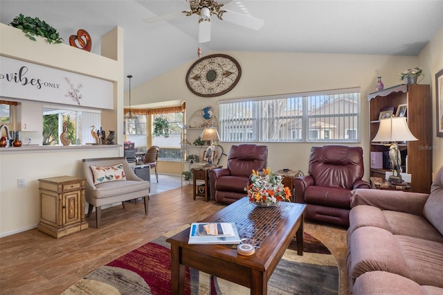 living room featuring lofted ceiling and ceiling fan