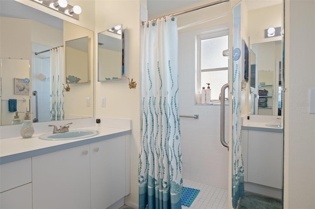 bathroom with vanity and curtained shower