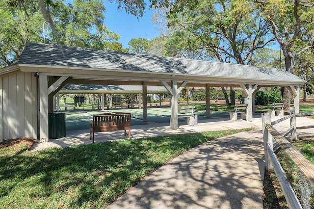 view of home's community with a yard