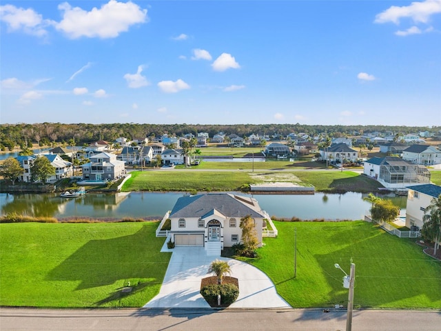 bird's eye view with a water view