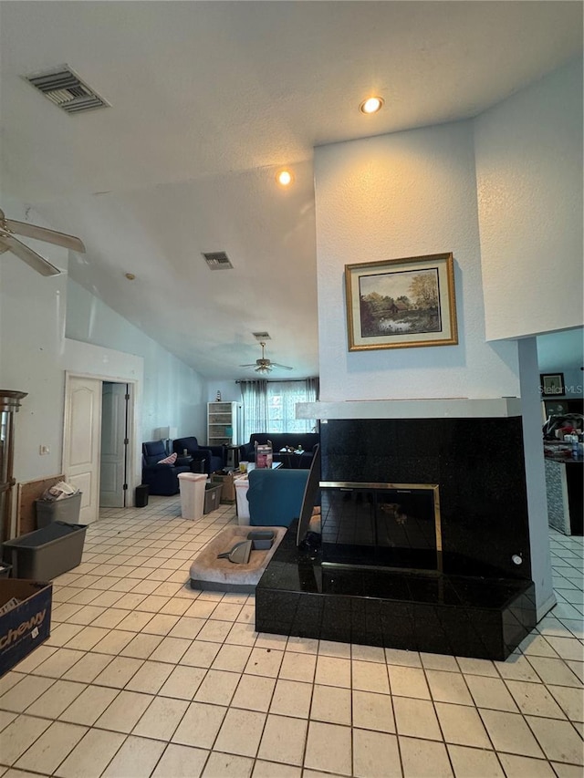 interior space with ceiling fan and lofted ceiling