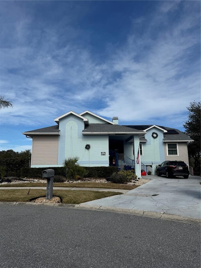 5771 Catskill Rd, Holiday, FL 34690 - view of front of house with driveway