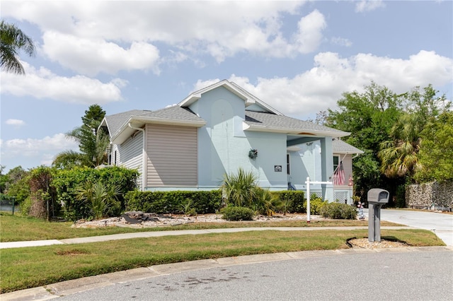 5771 Catskill Rd, Holiday, FL 34690 - bungalow featuring a front yard
