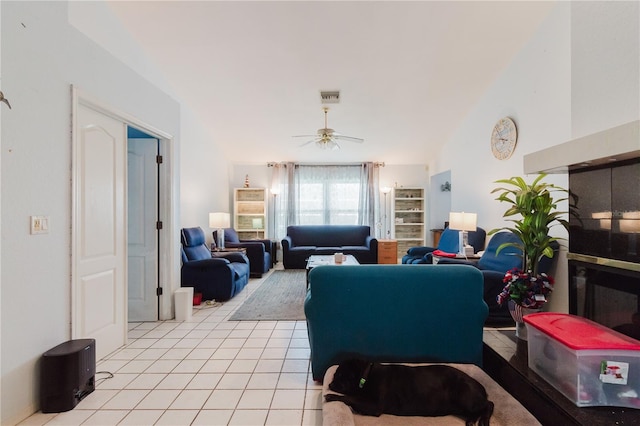 5771 Catskill Rd, Holiday, FL 34690 - living area with visible vents, a ceiling fan, and light tile patterned flooring