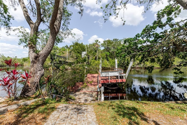 5771 Catskill Rd, Holiday, FL 34690 - view of dock with a water view