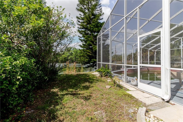 5771 Catskill Rd, Holiday, FL 34690 - view of yard featuring a lanai