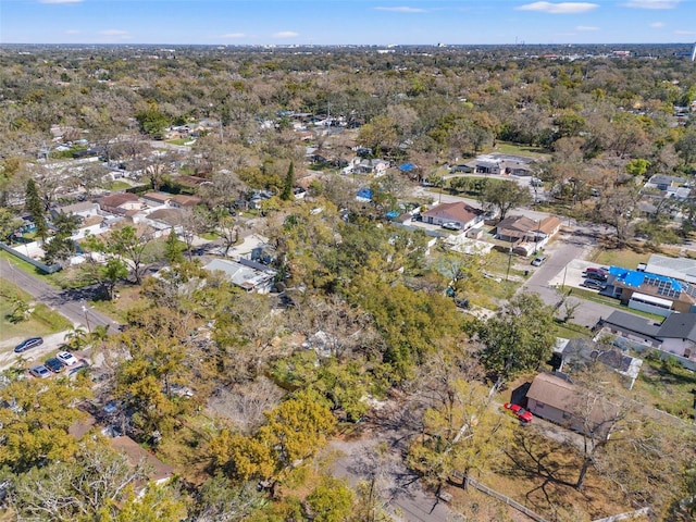 drone / aerial view featuring a forest view