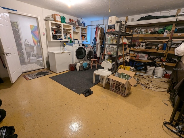 storage area featuring washer and dryer