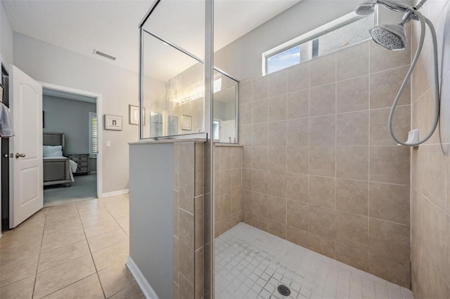 full bathroom with a walk in shower, visible vents, ensuite bath, and tile patterned floors