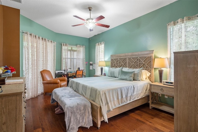 bedroom featuring dark hardwood / wood-style floors and ceiling fan