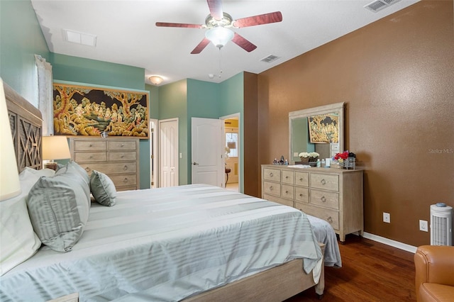 bedroom with dark wood-type flooring and ceiling fan