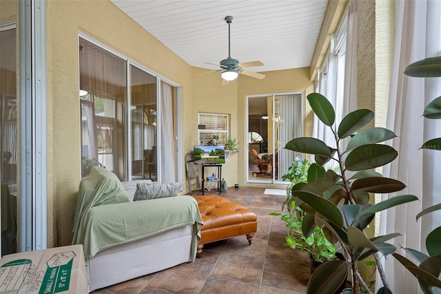 sunroom / solarium with ceiling fan