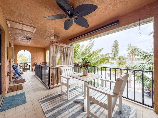 balcony featuring ceiling fan